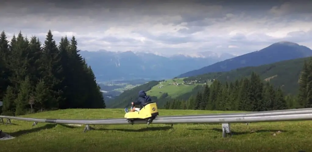 Boy riding the Mieders alpine coaster in Austria